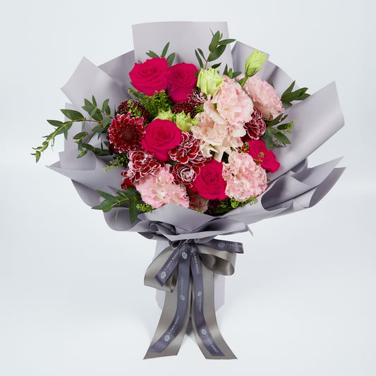 Magenta rose and pink eustoma bouquet