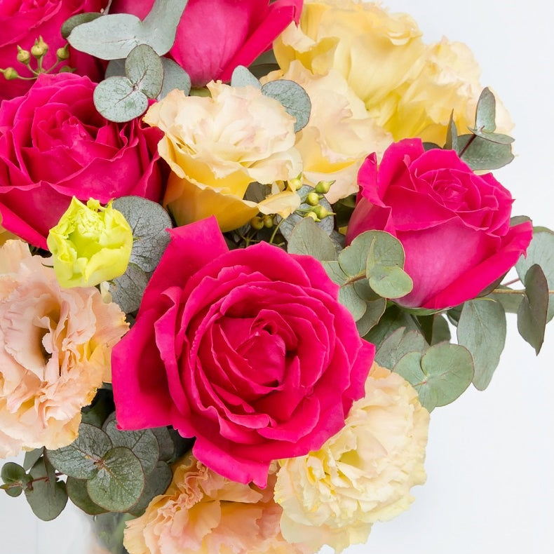 Magenta roses & eustoma with vase