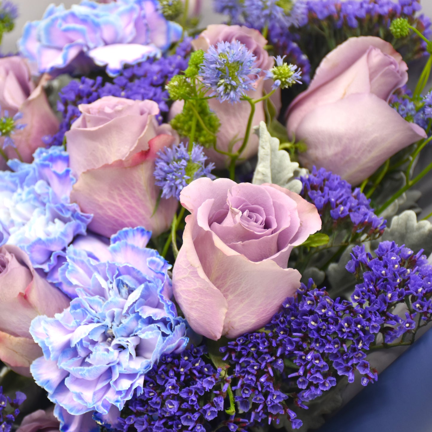 Purple Rose and Dyed Dianthus bouquet