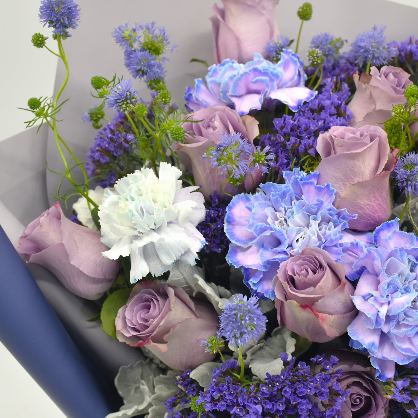 Purple Rose and Dyed Dianthus bouquet